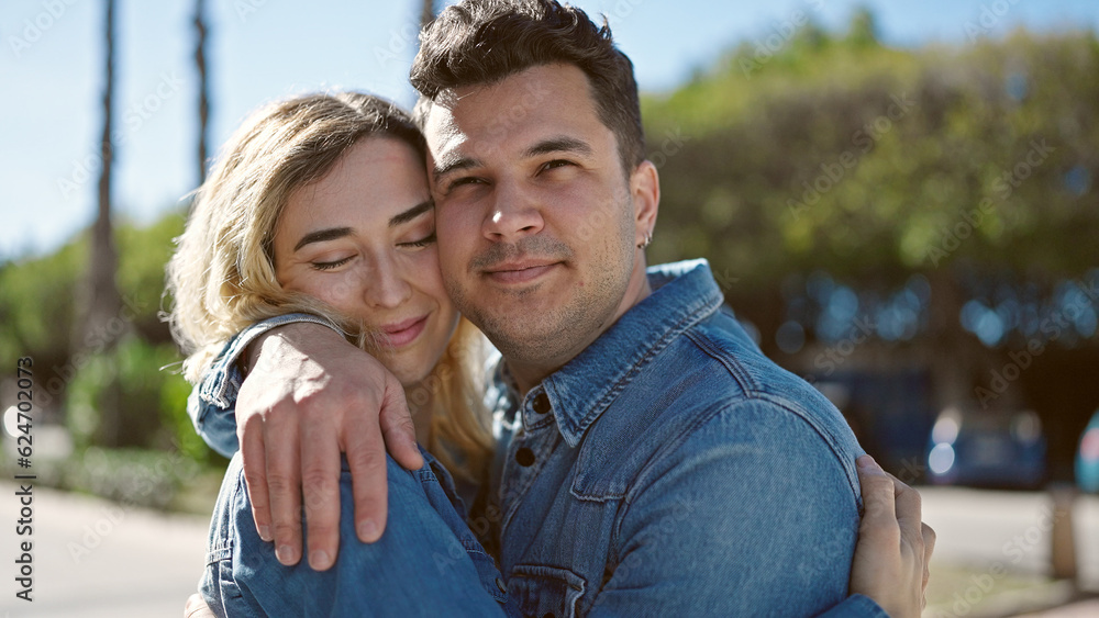 Man and woman couple smiling confident hugging each other at park Man and woman couple smiling confident hugging each other at park