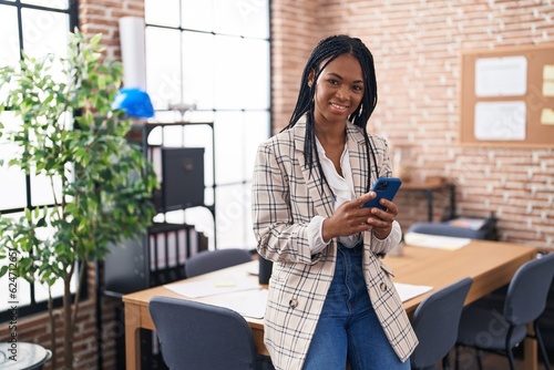African american woman business worker using smartphone at office