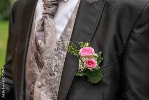 Fototapete Pink rose boutonniere flower groom wedding coat with tie shirt