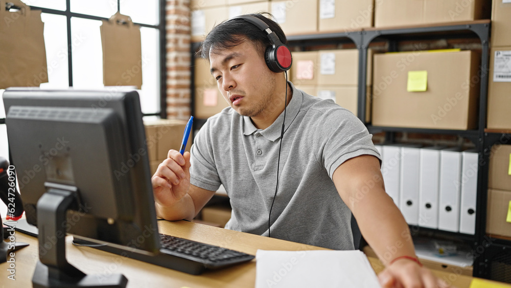 ecommerce business worker having video call writing on document at office ecommerce business worker having video call writing on document at office