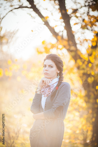Serene Brunette Amidst the Autumn Fores