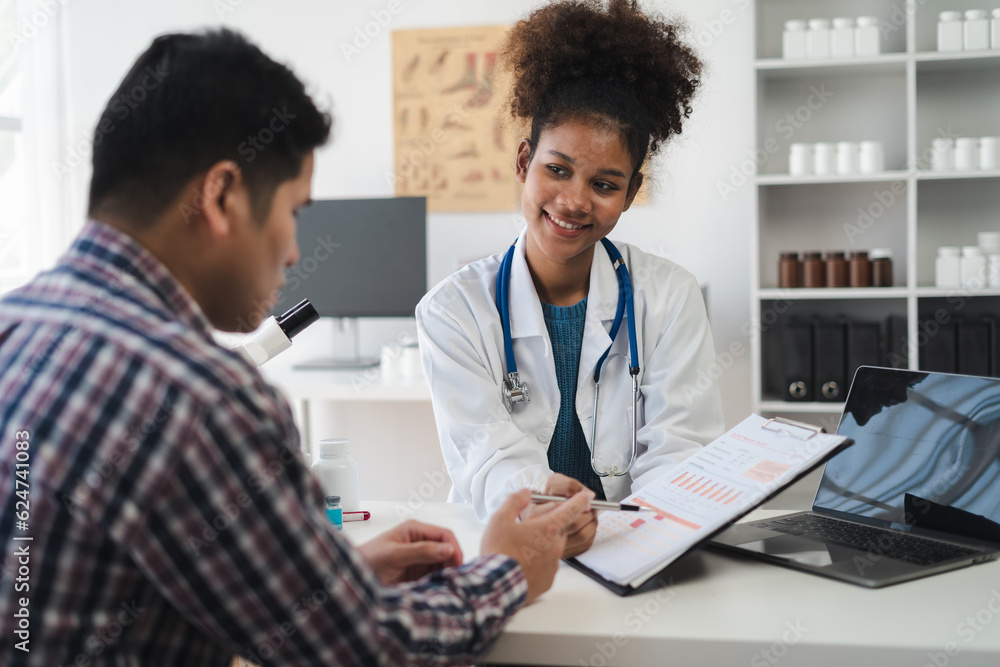 Doctor and patient are discussing something, just hands at the table at clinic. Doctor and patient are discussing something, just hands at the table at clinic.