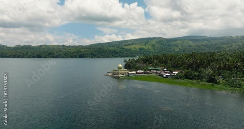 Lake Lanao and Linuk Masjid with small residential houses in Lanao del Sur. Mindanao, Philippines. photo