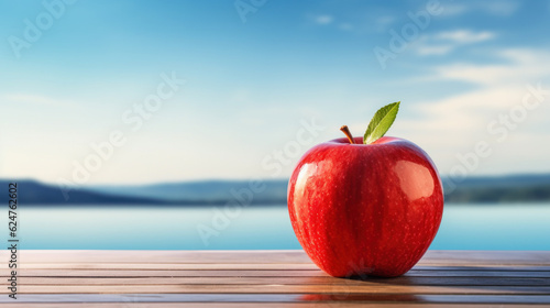 closeup of red apple and leaf