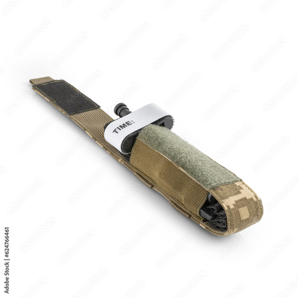 Open military tactical pouch in pixel camouflage with tourniquet inside. Military gear. First aid tool for bleeding. Open military tactical pouch in pixel camouflage with tourniquet inside. Military gear. First aid tool for bleeding.