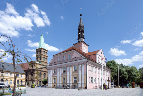 Miedzyrzecz, Poland - the town hall and St. Adalbert church in summer scenery photo