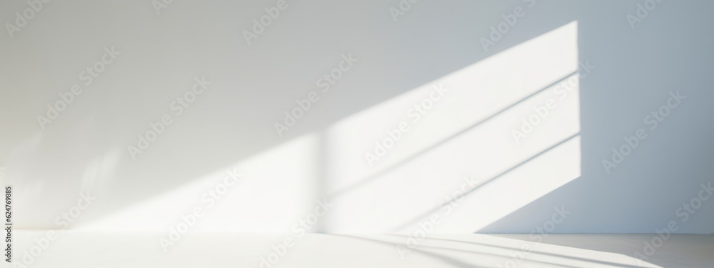 Obraz premium light background. light and shadows from the window, creating a light pattern on the wall banner