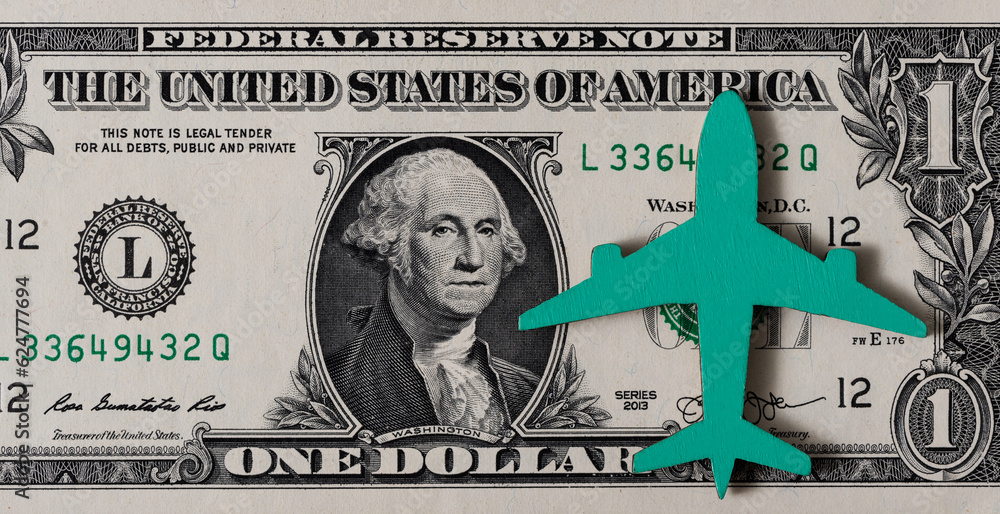 The symbolic figure of an airplane on a bill of denomination of 1 US ...