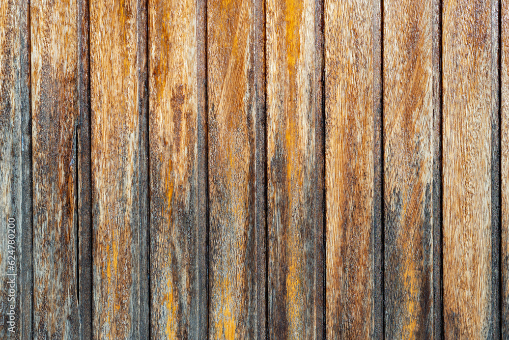 Abstract rotting varnished vertical wooden planks background Abstract rotting varnished vertical wooden planks background