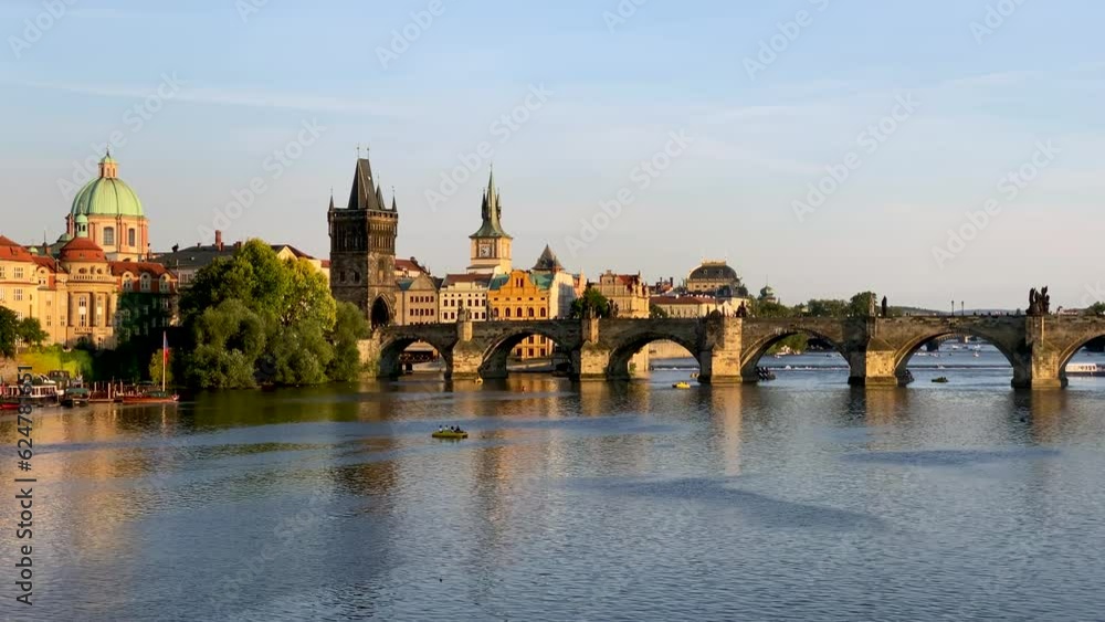 Scenic view of the Old Town pier architecture and Charles Bridge over Vltava river in Prague, Czech Republic. Prague iconic Charles Bridge (Karluv Most) and Old Town Bridge Tower at sunset, Czechia. Scenic view of the Old Town pier architecture and Charles Bridge over Vltava river in Prague, Czech Republic. Prague iconic Charles Bridge (Karluv Most) and Old Town Bridge Tower at sunset, Czechia.