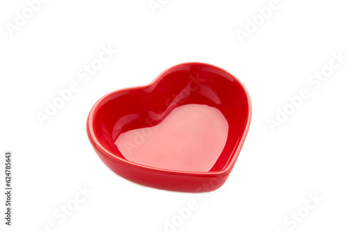 Red heart shaped bowls isolated on white background.