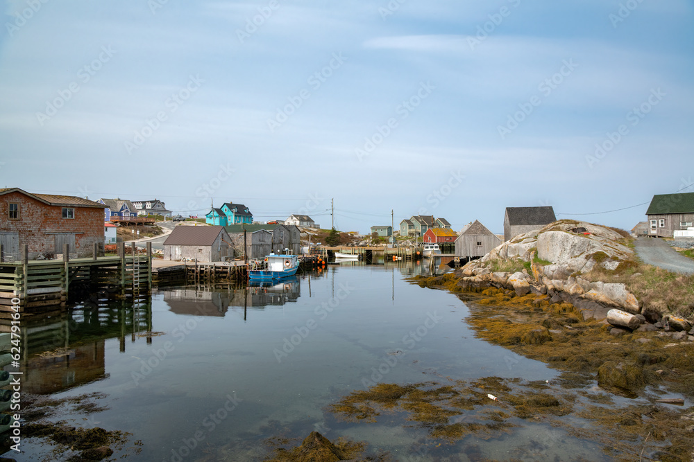 Fishing village in a cove at low tide on the coast of the Atlantic Ocean.