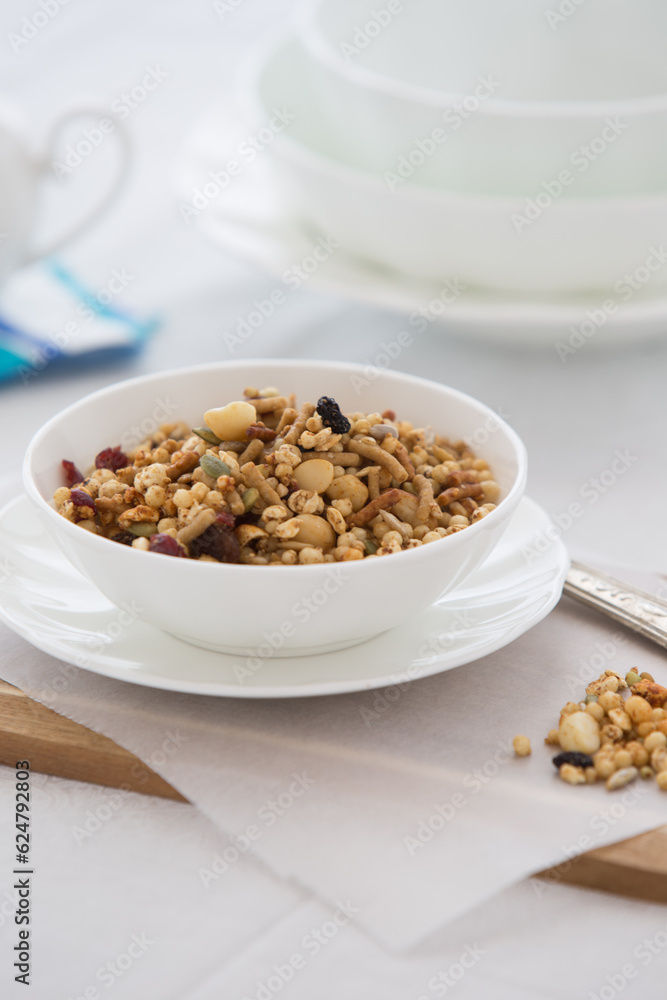 Bowl of organic Granola served at a table Bowl of organic Granola served at a table