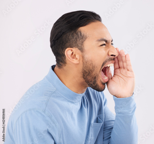 Hands, screaming and angry asian man in studio with announcement, message or warning on grey background. Noise, news and shouting Japanese guy with deal, sale or coming soon promotion, speech or info