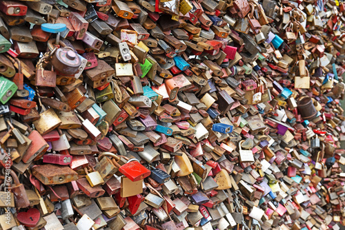 Padlocks are placed on the Hohenzollern Bridge in Cologne, Germany as a romantic gesture. © John