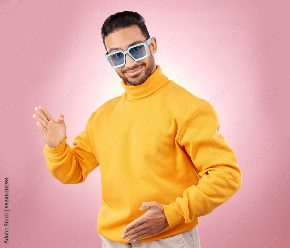 Man, robot dance and sunglasses in studio portrait with smile, moving or fashion for aesthetic by pink background. Asian gen z student, happy and clothes in futuristic glasses, comic dancing or party