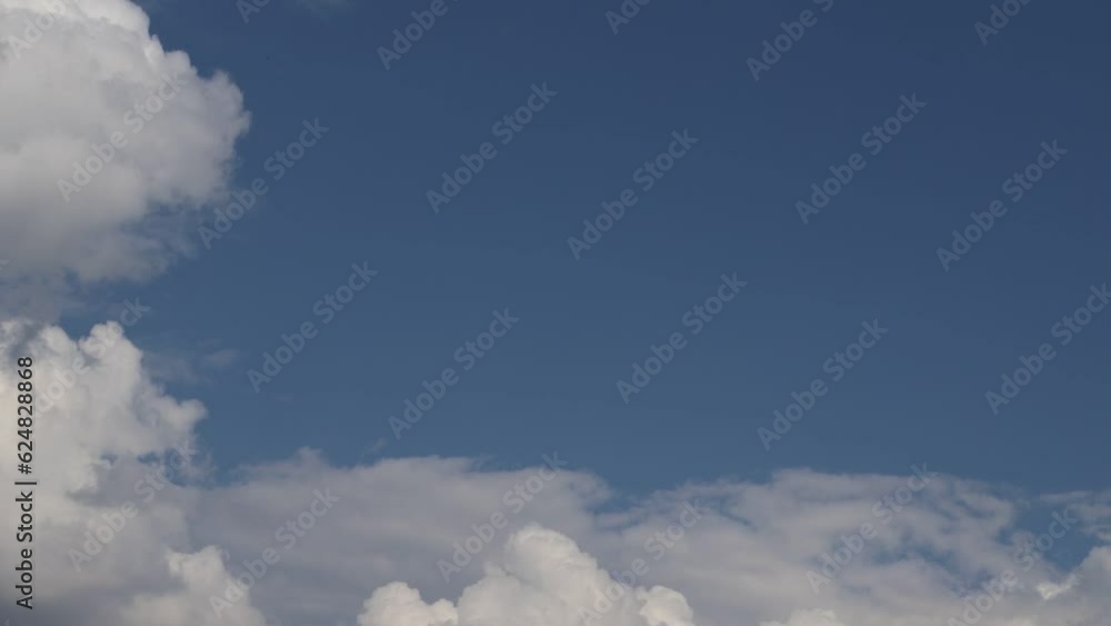 clouds run across the blue sky. timelapse. background clouds run across the blue sky. timelapse. background