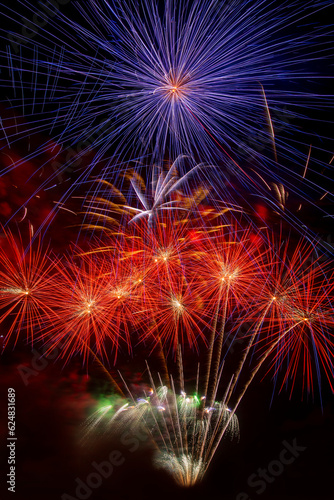 beautiful colorful firework display set and reflec on water for celebration happy new year and merry christmas and  fireworks on black background