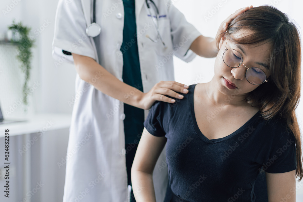 Doctor diagnosing female patient neck and shoulder pain. Doctor diagnosing female patient neck and shoulder pain.