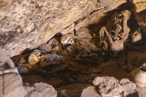 Cementerio de Chullpas / Cueva de las Momias: Cave with mummies near Coqueza, a village at the edge of the famous salt flats Salar de Uyuni in Bolivia photo