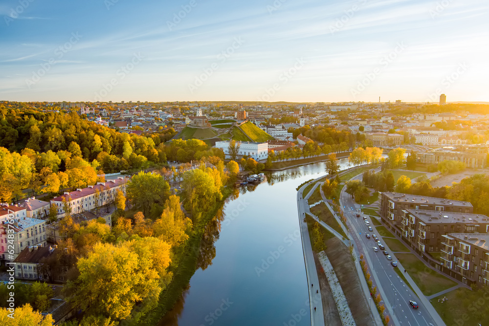Beautiful Vilnius city panorama in autumn with orange and yellow foliage. Aerial evening view. Beautiful Vilnius city panorama in autumn with orange and yellow foliage. Aerial evening view.