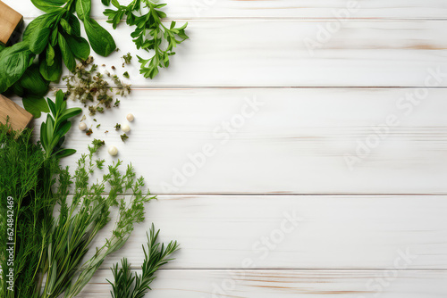 Above view of healing herbs and flowers with leaves lying on white wooden boardwalk vintage surface with copy space. Banner template picture frame herbal healing and natural medicine.