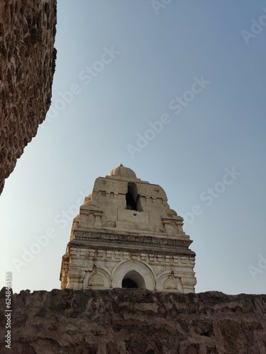 Discover the breathtaking beauty of Katas Raj Temples through this stunning collection of pictures. Nestled in the serene landscape of Pakistan, these Hindu temples date back to the 6th century. photo