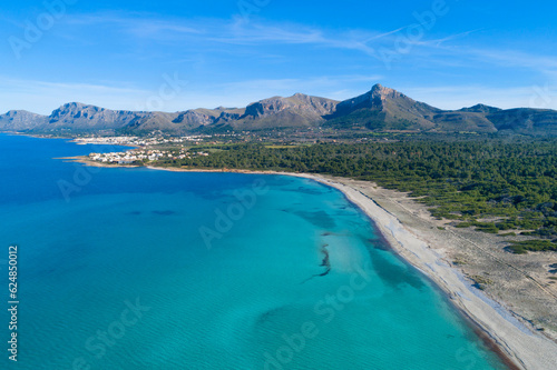 Majorca beach. Sa Canova (Son Serra de Marina). Aerial view. A large sandy area in the north of the island of Mallorca, surrounded by pine forests, next to a stream. Balearic Islands, Spain.