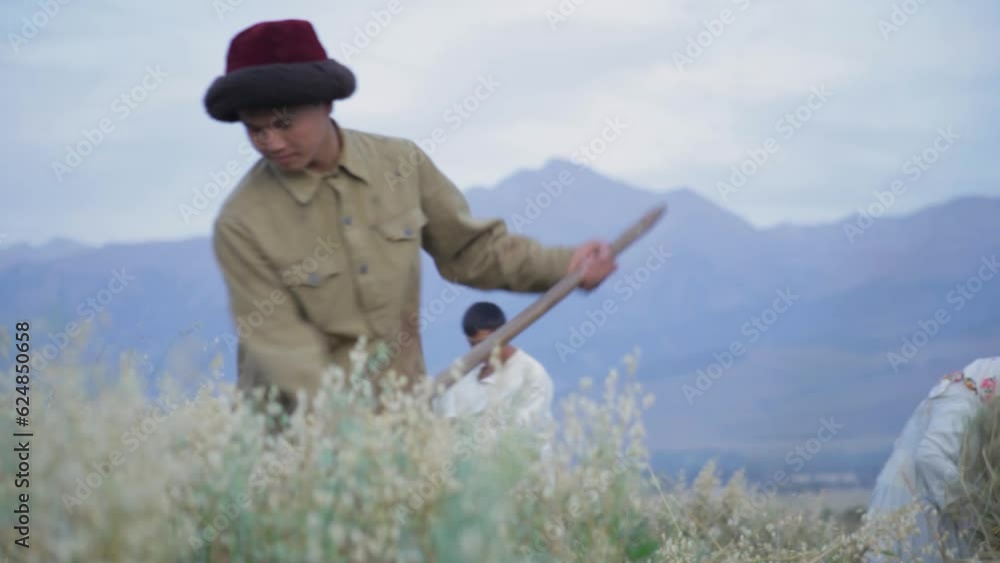 The period of the war 1941-1945. Old children work in the field The period of the war 1941-1945. Old children work in the field