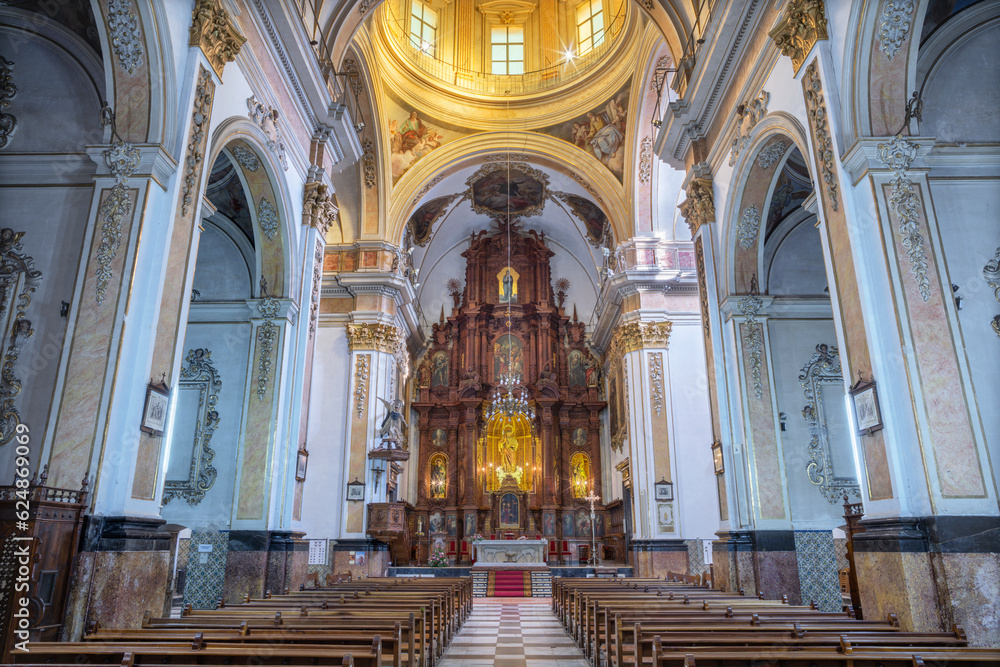 VALENCIA, SPAIN - FEBRUAR 17, 2022: The nave of church Iglesia de Santo Tomas with the altar by Francisco Hurtado Soto as a copy of original destructed by civil war.