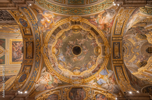 GENOVA, ITALY - MARCH 5, 2023: The side cupola with the fresco of cardinal virtues and prophets and in the church Chiesa del Gesu by Bernardo Castello from 17. cent.