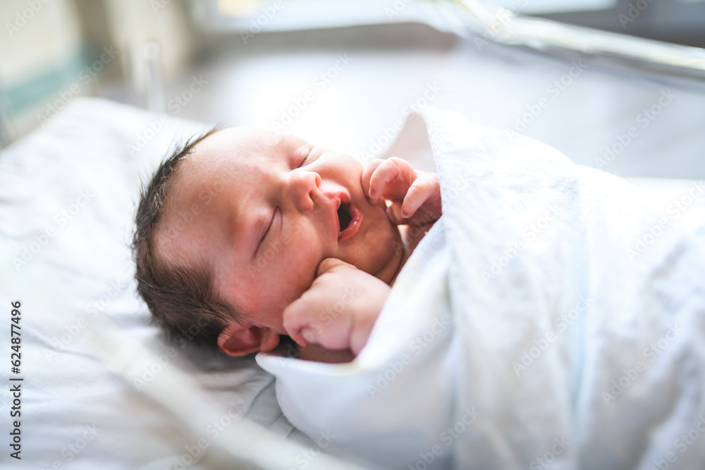 Adorable Caucasian Newborn Child Lying in Hospital Bed Adorable Caucasian Newborn Child Lying in Hospital Bed