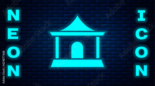 Glowing neon Traditional chinese house icon isolated on brick wall background. Vector