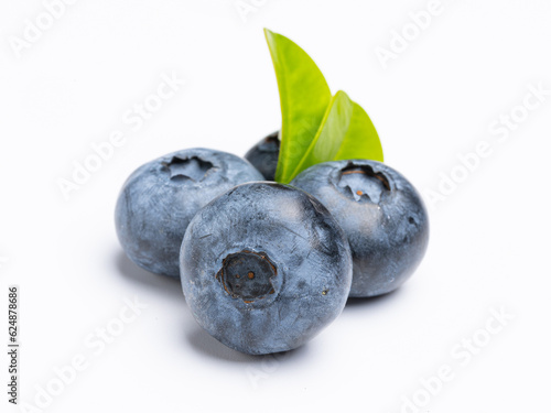 Blueberry isolated. Blueberries with leaves on white. Blueberries on a white background. Full depth of field.