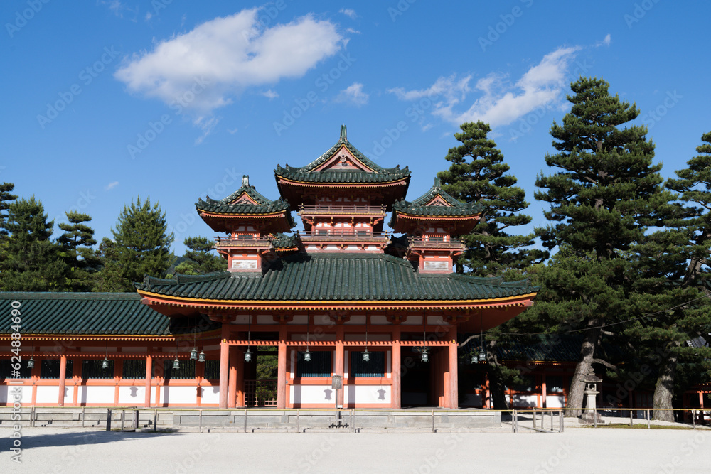 Traditional temple landmark building at Heian Jingu shinto or buddhist religious shrine seen in Kyoto Japan on a luxury holiday as a tourist 