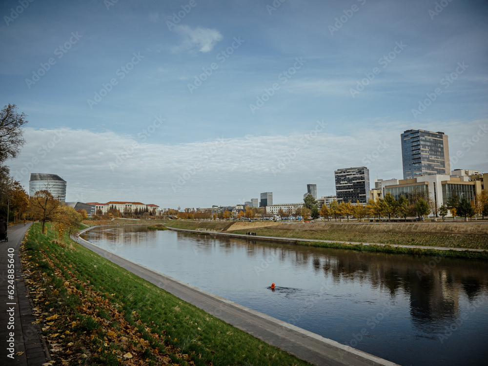 Neris River with the modern buildings of the new city center (southern Snipiskes)