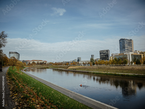 Neris River with the modern buildings of the new city center (southern Snipiskes)