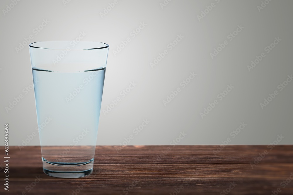 Transparent glass with clean water on a table Transparent glass with clean water on a table