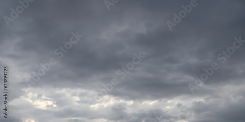 gray sky with dark clouds background © Ulrich