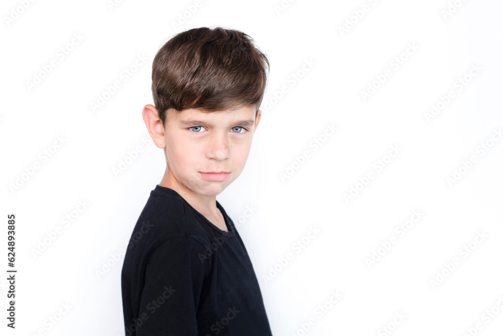 A young boy on a light background is trying to smile, he was sad, scared, now he is better and he is glad that his pain, worries are over A young boy on a light background is trying to smile, he was sad, scared, now he is better and he is glad that his pain, worries are over