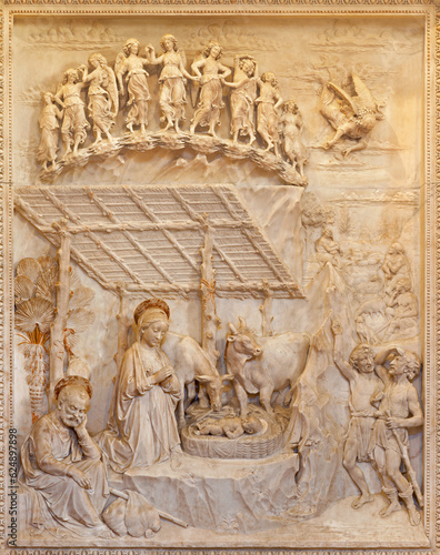 NAPLES, ITALY - APRIL 21, 2023: The marble relief of Nativity in the church Chiesa di Sant'Anna dei Lombardi by Antonio Rossellino ( 1475). photo