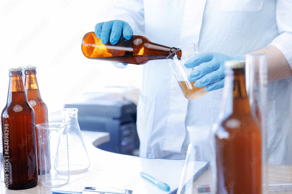 Foto de Process test production beer in laboratory, analysis drink in