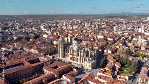 Aerial perspective of Santa María de Regla de León Cathedral. A Catholic church initiated in the 13th century, it is one of the greatest works of the Gothic style. Drone spinning around the cathedral photo
