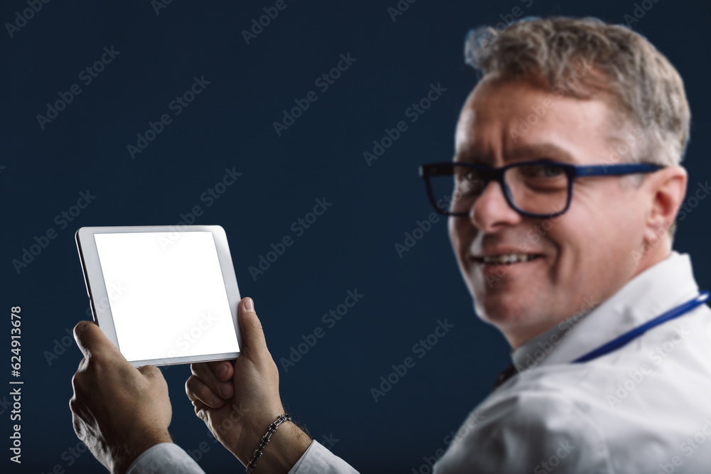 Enthusiastic doctor holds blank-screen tablet Enthusiastic doctor holds blank-screen tablet