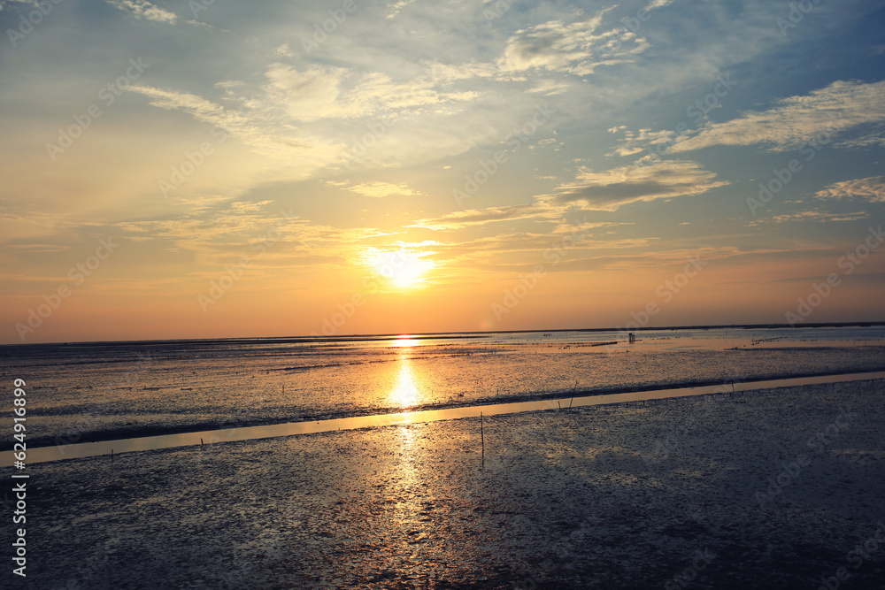 Beautiful natural viewpoint at Chonburi province, sunset over the sea during Low tide period time.