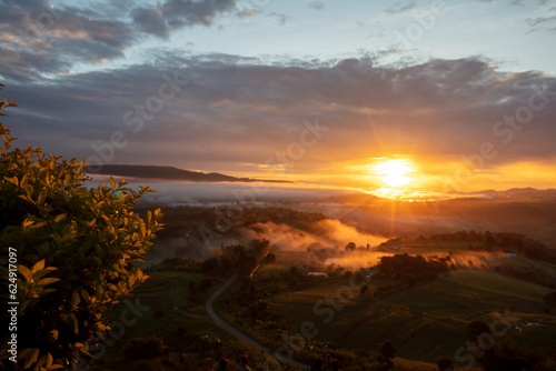 Beautiful natural view sunrise over mountain and hill.