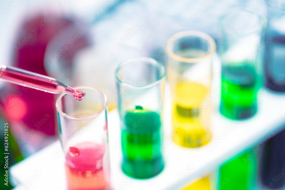 Education Laboratory, Set of glass for trial Science with the test tube, Begerglass, conical flask with the colorful solution chemical and microscope on the table in white background Education Laboratory, Set of glass for trial Science with the test tube, Begerglass, conical flask with the colorful solution chemical and microscope on the table in white background