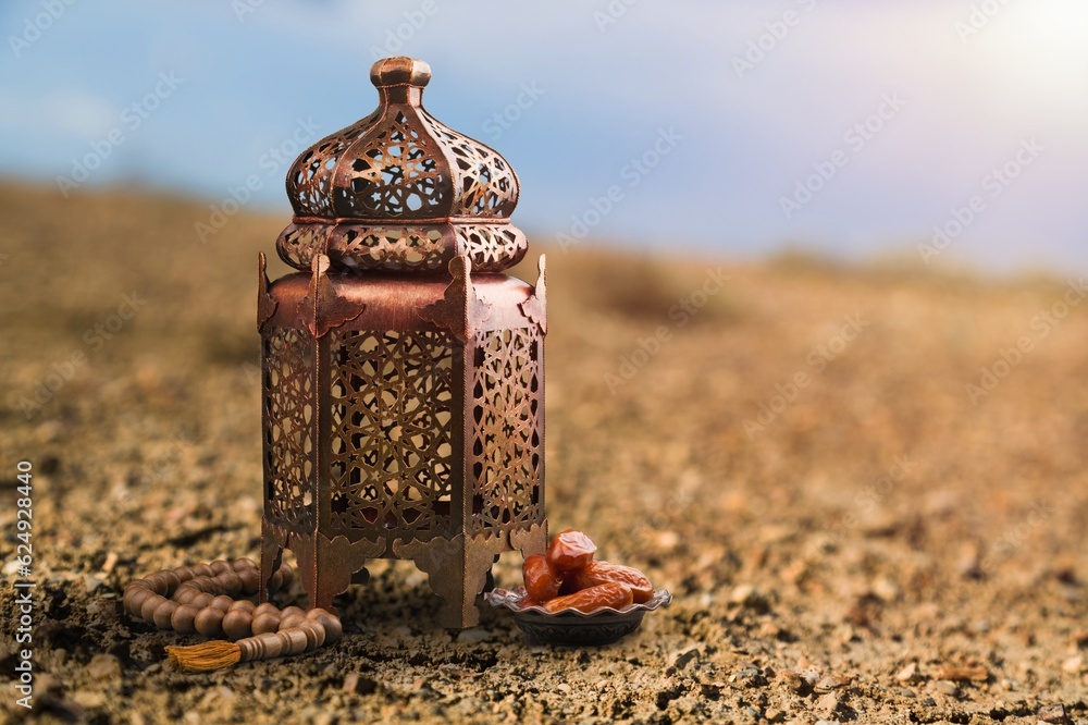 Ramadan Kareem concept, Arabic lantern on sand beach Ramadan Kareem concept, Arabic lantern on sand beach