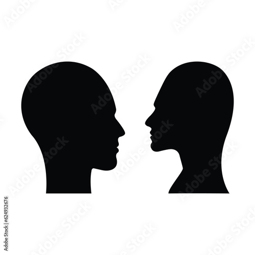 Male and female face profile silhouette vector icon in a glyph pictogram illustration © TukTuk Design