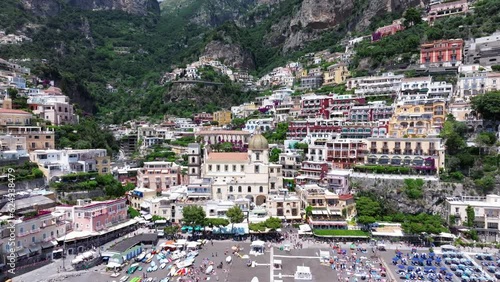 Wallpaper Mural Positano, tourist destination on the Amalfi Coast, Italy. Aerial view of Colorful houses on a Tyrrhenian sea coast seen through green juicy flora in Positano is a village in Naples metropolitan area Torontodigital.ca